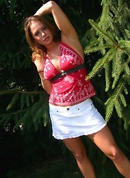 Jade on all fours in the forest