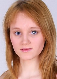 Natural redhead girl shows off her naked tight body