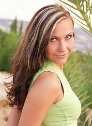 Cute blonde babe strips in the desert